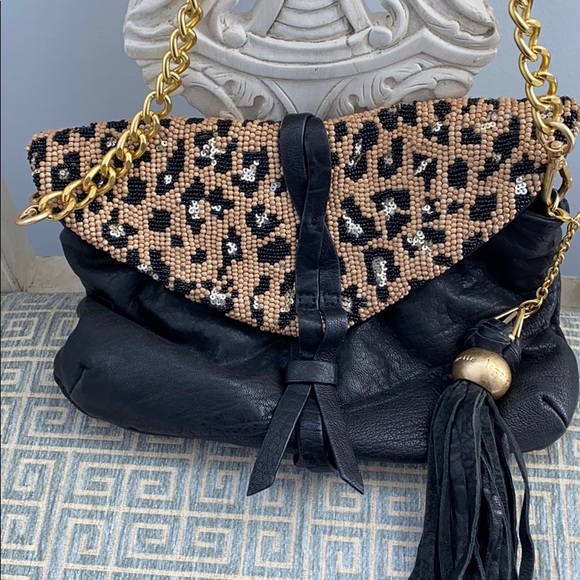 Nanette Lepore Handbags - Authentic Nanette Leopore Leopard Purse Leather